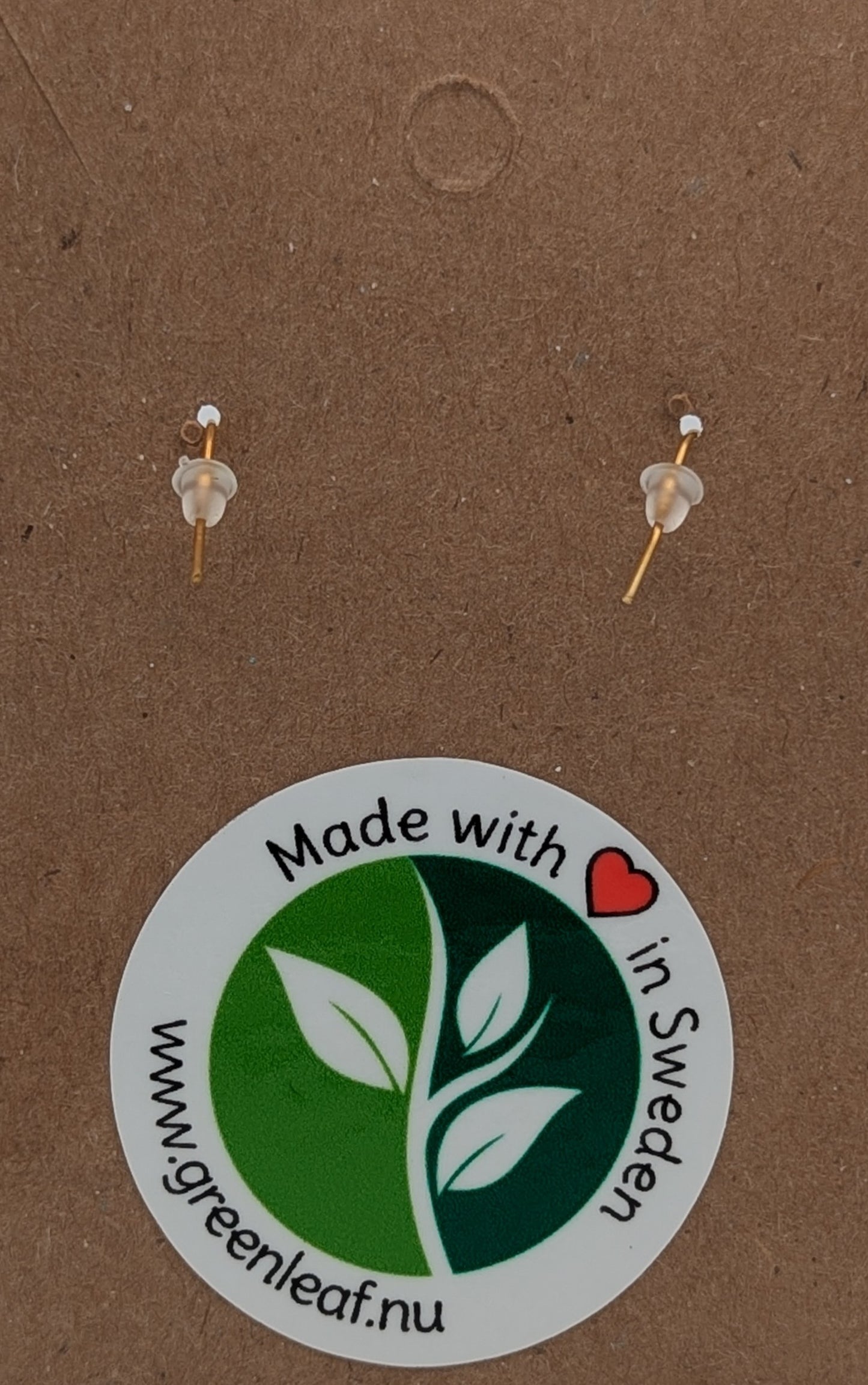 Pair of earrings on a brown card with 'Made with love in Sweden' label. www.greenleaf.nu